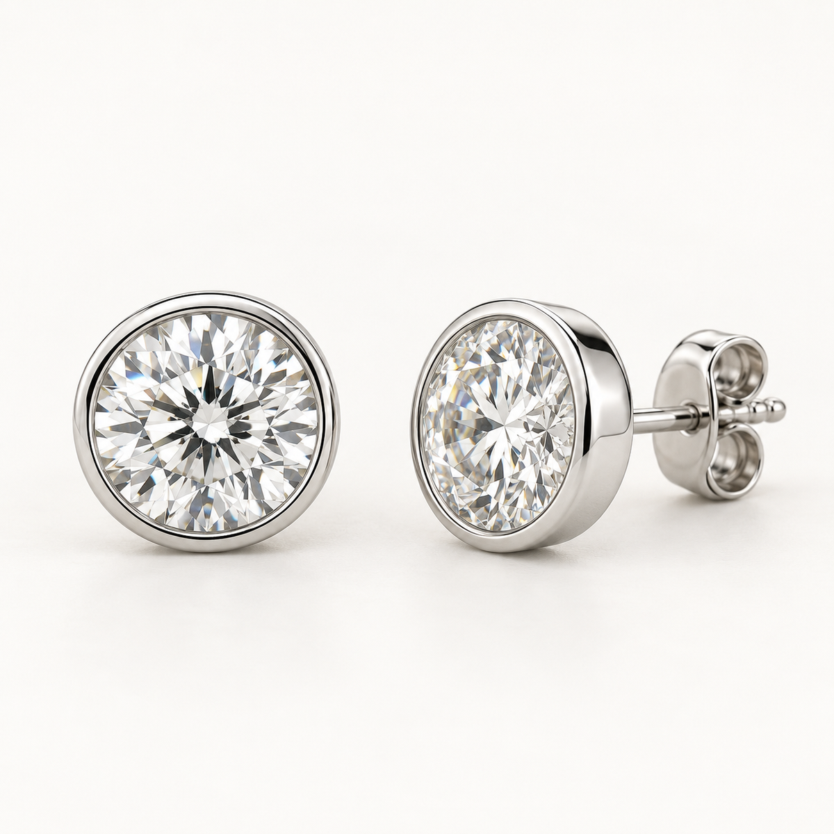 Halora Diamond Studs, 2 Carats Total, 14K White Gold, round diamonds in bezel settings — AI design rendering.