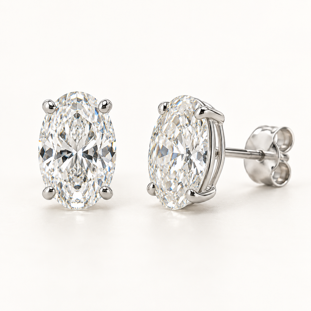 Ovelle Diamond Studs, 2 Carats Total, 14K White Gold, oval diamonds in four-prong basket settings — AI design rendering.